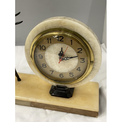 30A - A MARBLE CIRCULAR CLOCK ON A MARBLE BASE WITH A METAL GAZELLE DECORATION BASE 40CM X 10CM