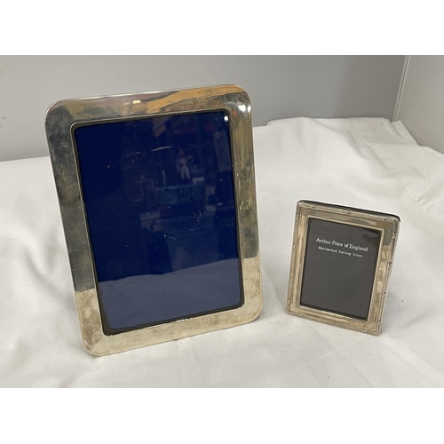 37 - TWO MARKED SILVER PHOTOGRAPH FRAMES ONE 20CM X 15CM AND ONE 10.5CM X 8CM