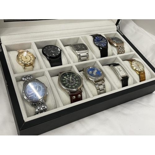 40A - TWELVE VARIOUS WATCHES IN A PRESENTATION BOX TO INLCUDE TWO SKAGEN, A JAGUAR, DKNY ETC