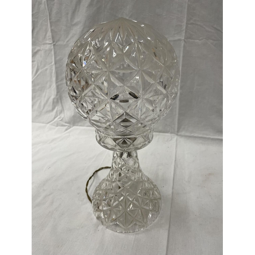 46 - A CUT GLASS TABLE LAMP WITH MATCHING GLOBE SHADE