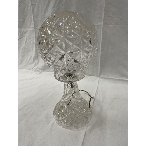 46 - A CUT GLASS TABLE LAMP WITH MATCHING GLOBE SHADE