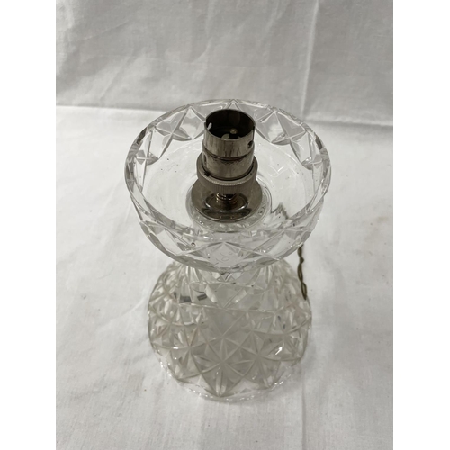 46 - A CUT GLASS TABLE LAMP WITH MATCHING GLOBE SHADE