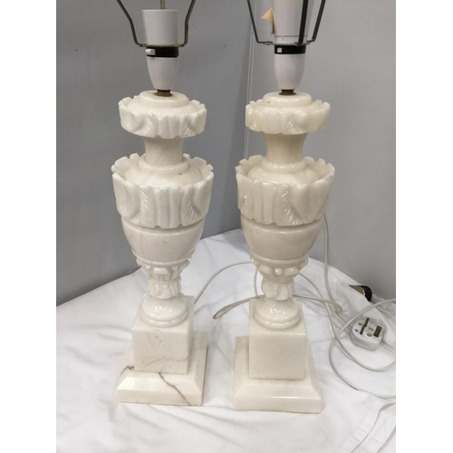 55 - A PAIR OF CARVED WHITE MARBLE TABLE LAMPS