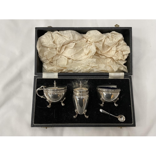 6 - A BOXED HALLMARKED BIRMINGHAM SILVER CRUET SET WITH BLUE GLASS LINERS (ONE SPOON MISSING) GROSS WEIG... 