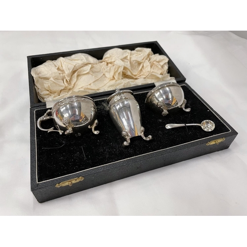 6 - A BOXED HALLMARKED BIRMINGHAM SILVER CRUET SET WITH BLUE GLASS LINERS (ONE SPOON MISSING) GROSS WEIG... 