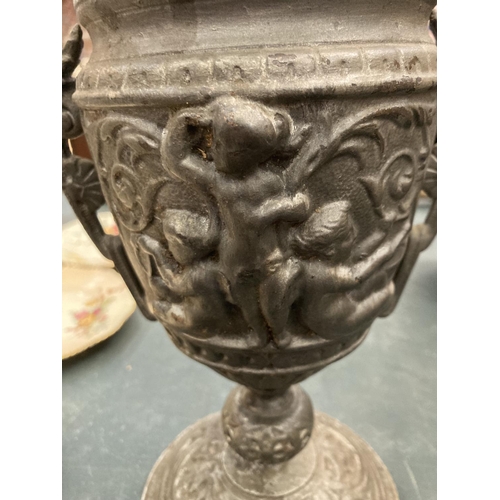 78 - A VICTORIAN CAST IRON EMBOSSED POT HEIGHT 23CM