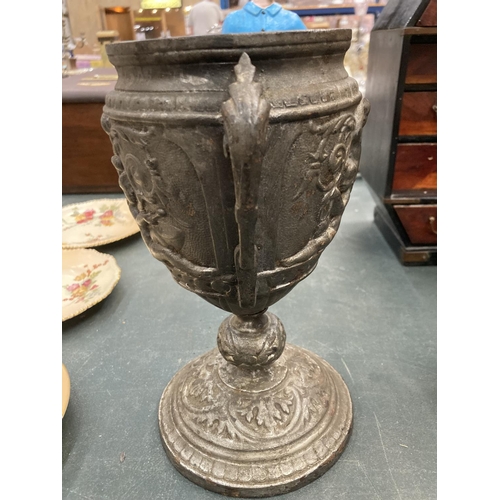 78 - A VICTORIAN CAST IRON EMBOSSED POT HEIGHT 23CM