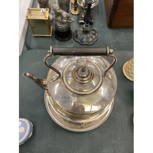 83 - A SILVER PLATED SPIRIT KETTLE ON A TRAY