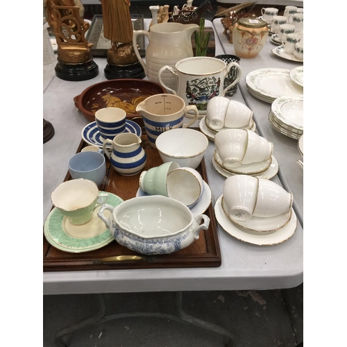 91 - A QUANTITY OF CHINA AND CERAMIC ITEMS TO INCLUDE CHINA CUPS, SAUCERS, PLATES, BLUE AND WHITE POTTERY... 