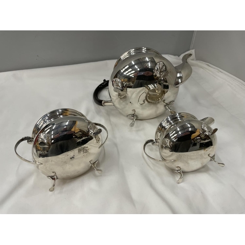 1 - A THREE PIECE HALLMARKED BIRMINGHAM SILVER TEA SET TO INCLUDE A TEAPOT, TWIN HANDLED SUGAR BOWL AND ... 