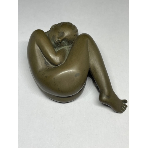 12A - A SCULPTURE OF A SLEEPING GIRL SIGNED D J  SCALDWELL