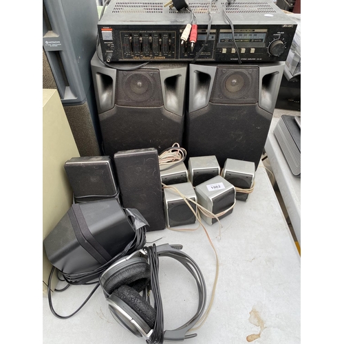 1982 - A FISHER STEREO AMPLIFIER AND A LARGE ASSORTMENT OF SPEAKERS