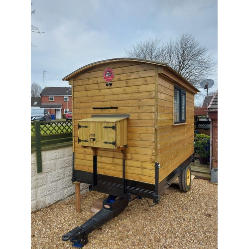 174 - A SHEPHERD'S HUT ON A MASSEY FERGUSON TIPPER TRAILER CHASSIS FULLY LINED WITH STOVE SINK TOILET SING... 