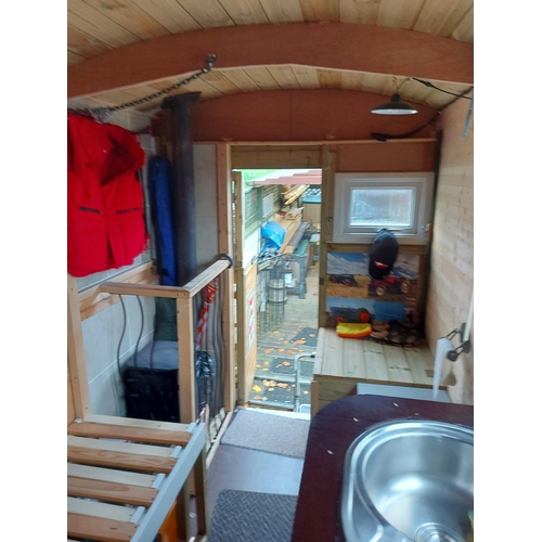 174 - A SHEPHERD'S HUT ON A MASSEY FERGUSON TIPPER TRAILER CHASSIS FULLY LINED WITH STOVE SINK TOILET SING... 