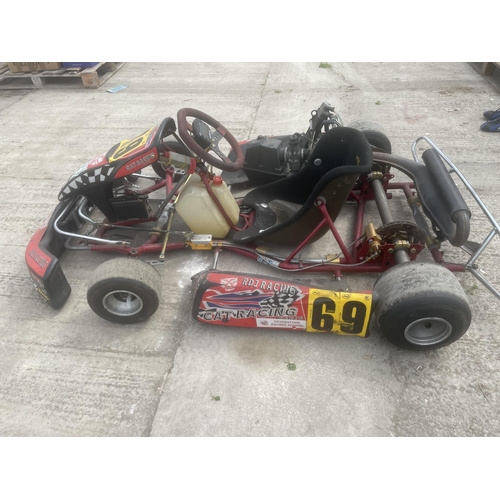 119 - A RACING GO KART WITH ROLSON ENGINE WHICH HAS DONE APPROX 4 HOURS ONLY IT IS GOVERNED FOR JUNIOR RAC... 