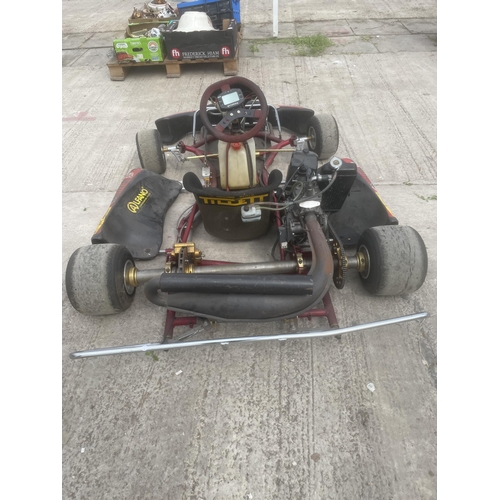 119 - A RACING GO KART WITH ROLSON ENGINE WHICH HAS DONE APPROX 4 HOURS ONLY IT IS GOVERNED FOR JUNIOR RAC... 