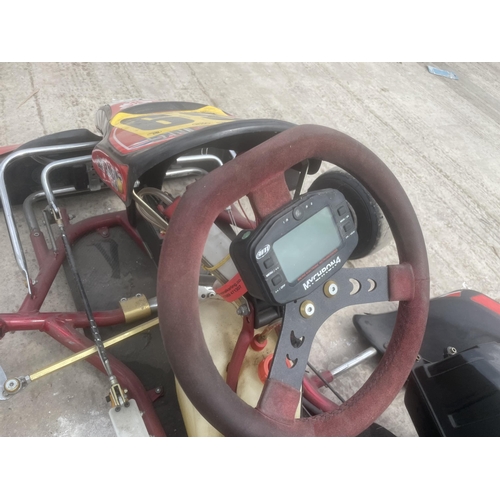 119 - A RACING GO KART WITH ROLSON ENGINE WHICH HAS DONE APPROX 4 HOURS ONLY IT IS GOVERNED FOR JUNIOR RAC... 