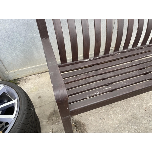 46 - A WOODEN GARDEN BENCH NO VAT