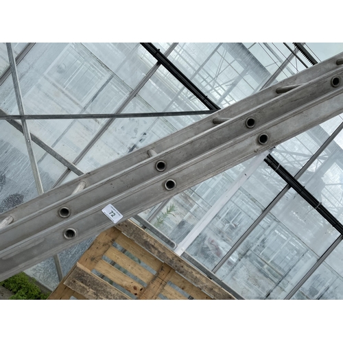 72 - AN ALUMINIUM 28 RUNG DOUBLE EXTENDABLE LADDER NO VAT