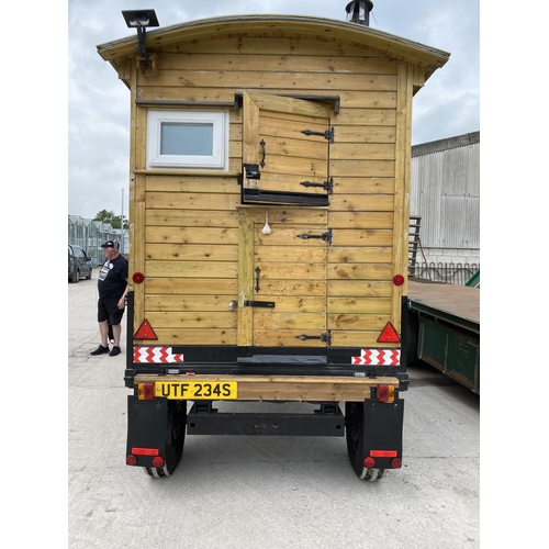 174 - A SHEPHERD'S HUT ON A MASSEY FERGUSON TIPPER TRAILER CHASSIS FULLY LINED WITH STOVE SINK TOILET SING... 