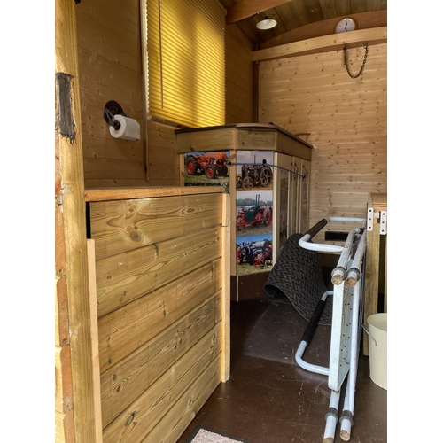 174 - A SHEPHERD'S HUT ON A MASSEY FERGUSON TIPPER TRAILER CHASSIS FULLY LINED WITH STOVE SINK TOILET SING... 