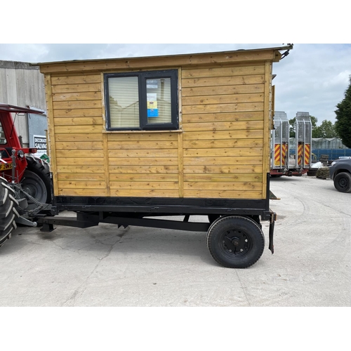 174 - A SHEPHERD'S HUT ON A MASSEY FERGUSON TIPPER TRAILER CHASSIS FULLY LINED WITH STOVE SINK TOILET SING... 