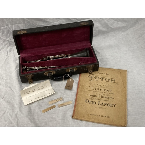 39 - A BOXED BOOSEY AND HAWKES CLARINET 77 BOEHM SYSTEM WITH SPARE REEDS AND 'PRACTICAL TUTOR FOR THE CLA... 