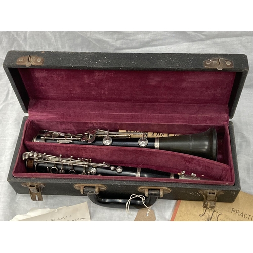 39 - A BOXED BOOSEY AND HAWKES CLARINET 77 BOEHM SYSTEM WITH SPARE REEDS AND 'PRACTICAL TUTOR FOR THE CLA... 