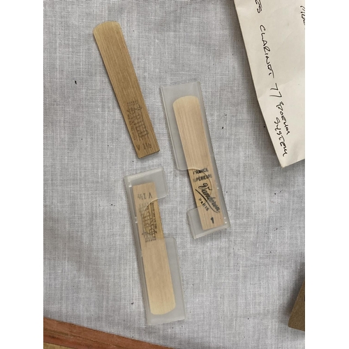 39 - A BOXED BOOSEY AND HAWKES CLARINET 77 BOEHM SYSTEM WITH SPARE REEDS AND 'PRACTICAL TUTOR FOR THE CLA... 