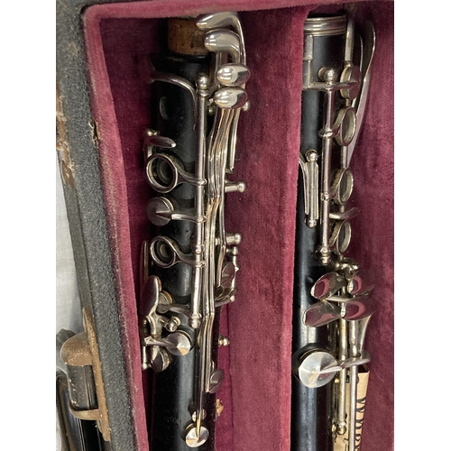 39 - A BOXED BOOSEY AND HAWKES CLARINET 77 BOEHM SYSTEM WITH SPARE REEDS AND 'PRACTICAL TUTOR FOR THE CLA... 