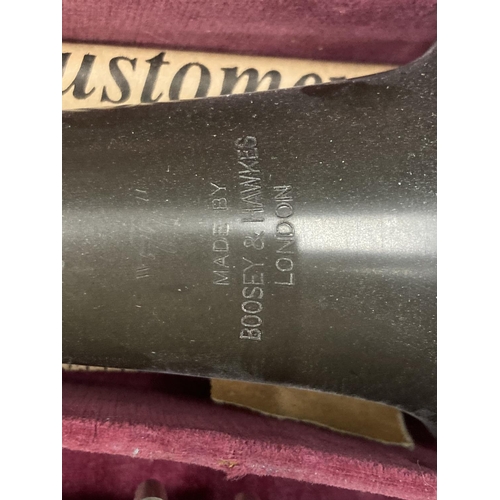 39 - A BOXED BOOSEY AND HAWKES CLARINET 77 BOEHM SYSTEM WITH SPARE REEDS AND 'PRACTICAL TUTOR FOR THE CLA... 