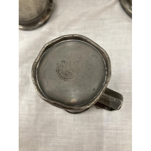 10 - A SET OF FIVE PEWTER GRADUATING MEASURING LIDDED JUGS MEASURING FROM LITRE TO DEMI-DECILITRE WITH TO... 