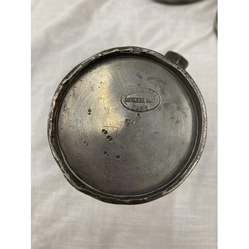 10 - A SET OF FIVE PEWTER GRADUATING MEASURING LIDDED JUGS MEASURING FROM LITRE TO DEMI-DECILITRE WITH TO... 