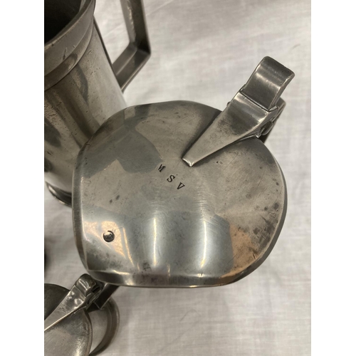 10 - A SET OF FIVE PEWTER GRADUATING MEASURING LIDDED JUGS MEASURING FROM LITRE TO DEMI-DECILITRE WITH TO... 