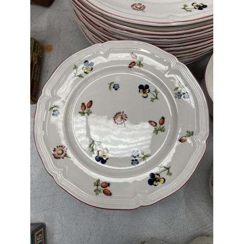 12 - A COLLECTION OF VILLEROY AND BOCH DINNERWARE TO INCLUDE DINNER PLATES, SIDE PLATES, CAKE PLATES, LAR... 