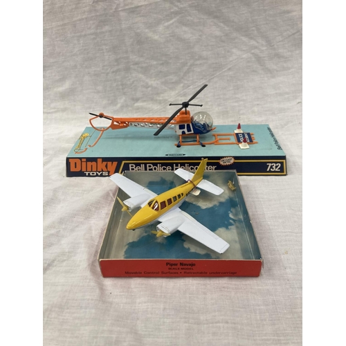 16 - A VINTAGE DINKY TOYS BELL POLICE HELICOPTER IN ORIGINAL BLISTER PACK AND A LINTOY PIPER NAVAJO IN OR... 