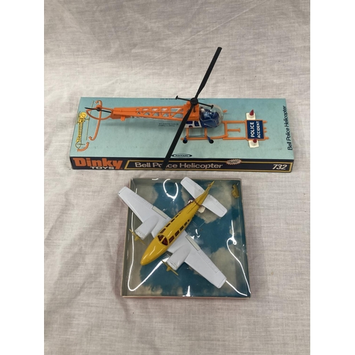 16 - A VINTAGE DINKY TOYS BELL POLICE HELICOPTER IN ORIGINAL BLISTER PACK AND A LINTOY PIPER NAVAJO IN OR... 