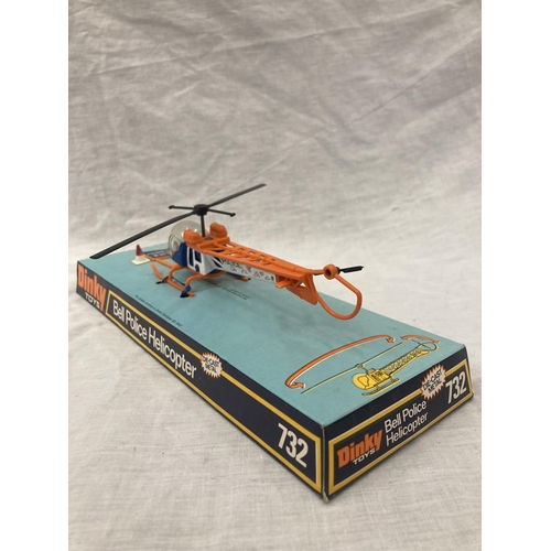 16 - A VINTAGE DINKY TOYS BELL POLICE HELICOPTER IN ORIGINAL BLISTER PACK AND A LINTOY PIPER NAVAJO IN OR... 