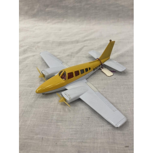 16 - A VINTAGE DINKY TOYS BELL POLICE HELICOPTER IN ORIGINAL BLISTER PACK AND A LINTOY PIPER NAVAJO IN OR... 