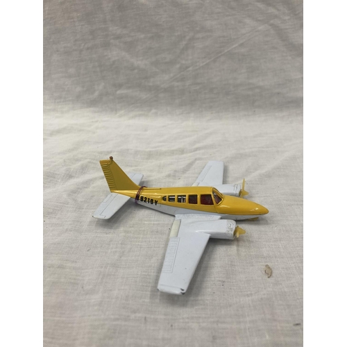 16 - A VINTAGE DINKY TOYS BELL POLICE HELICOPTER IN ORIGINAL BLISTER PACK AND A LINTOY PIPER NAVAJO IN OR... 