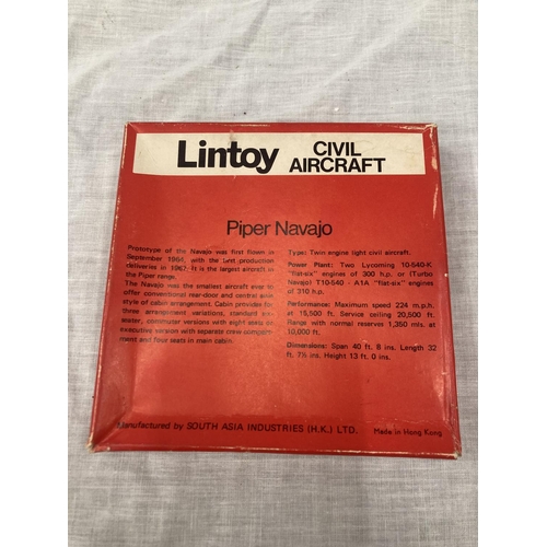 16 - A VINTAGE DINKY TOYS BELL POLICE HELICOPTER IN ORIGINAL BLISTER PACK AND A LINTOY PIPER NAVAJO IN OR... 