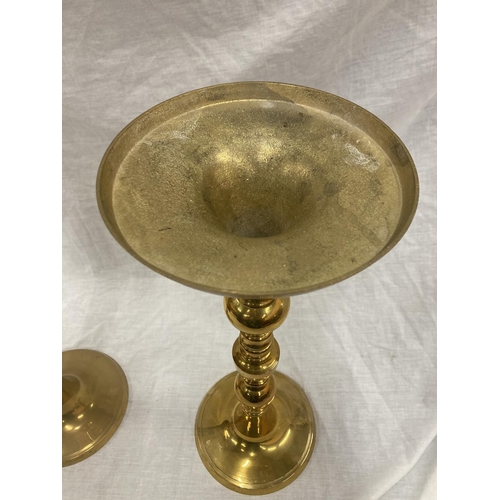 23 - A PAIR OF HEAVY BRASS PLANTERS ON RAISED BRASS BASE HEIGHT 65CM, DIAMETER 23CM