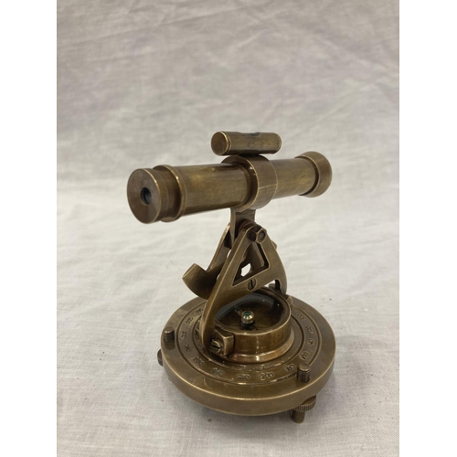24 - A BRASS MINIATURE TELESCOPE AND COMPASS - HEIGHT 10CM, WIDTH 9CM