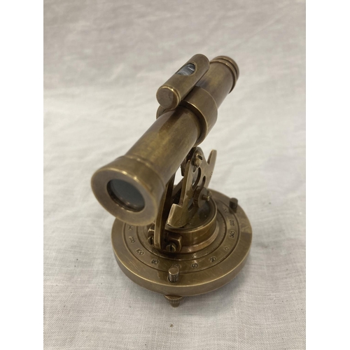 24 - A BRASS MINIATURE TELESCOPE AND COMPASS - HEIGHT 10CM, WIDTH 9CM