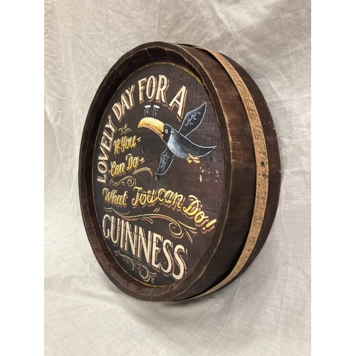 31 - A WOODEN GUINNESS BARREL TOP SIGN DIAMETER 37CM