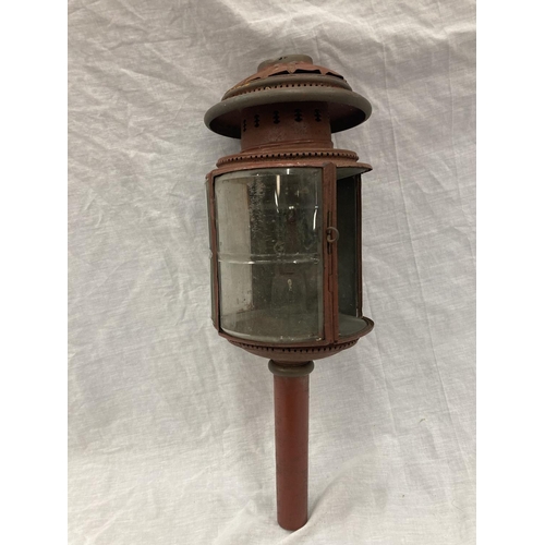 34 - A VINTAGE COACHING LAMP WITH BEVELLED GLASS - MISSING ONE GLASS PANEL HEIGHT APPROX 52CM