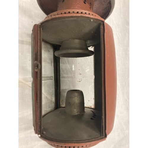 34 - A VINTAGE COACHING LAMP WITH BEVELLED GLASS - MISSING ONE GLASS PANEL HEIGHT APPROX 52CM