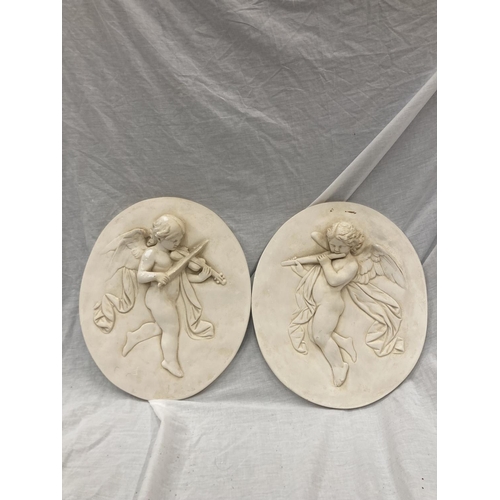 37 - A PAIR OF CHERUB WALL PLAQUES 33CM X 38CM
