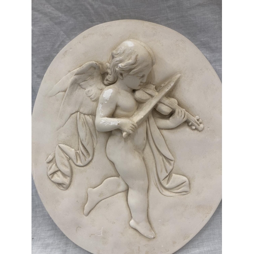 37 - A PAIR OF CHERUB WALL PLAQUES 33CM X 38CM