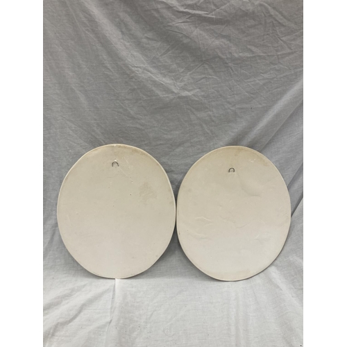 37 - A PAIR OF CHERUB WALL PLAQUES 33CM X 38CM